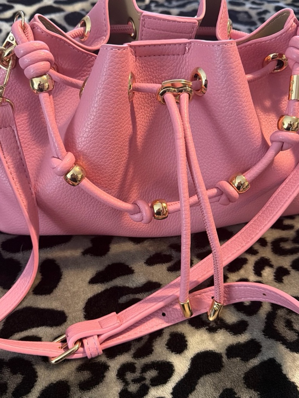 Pebbled Pink Drawstring Shoulder Bag with Gold Hardware